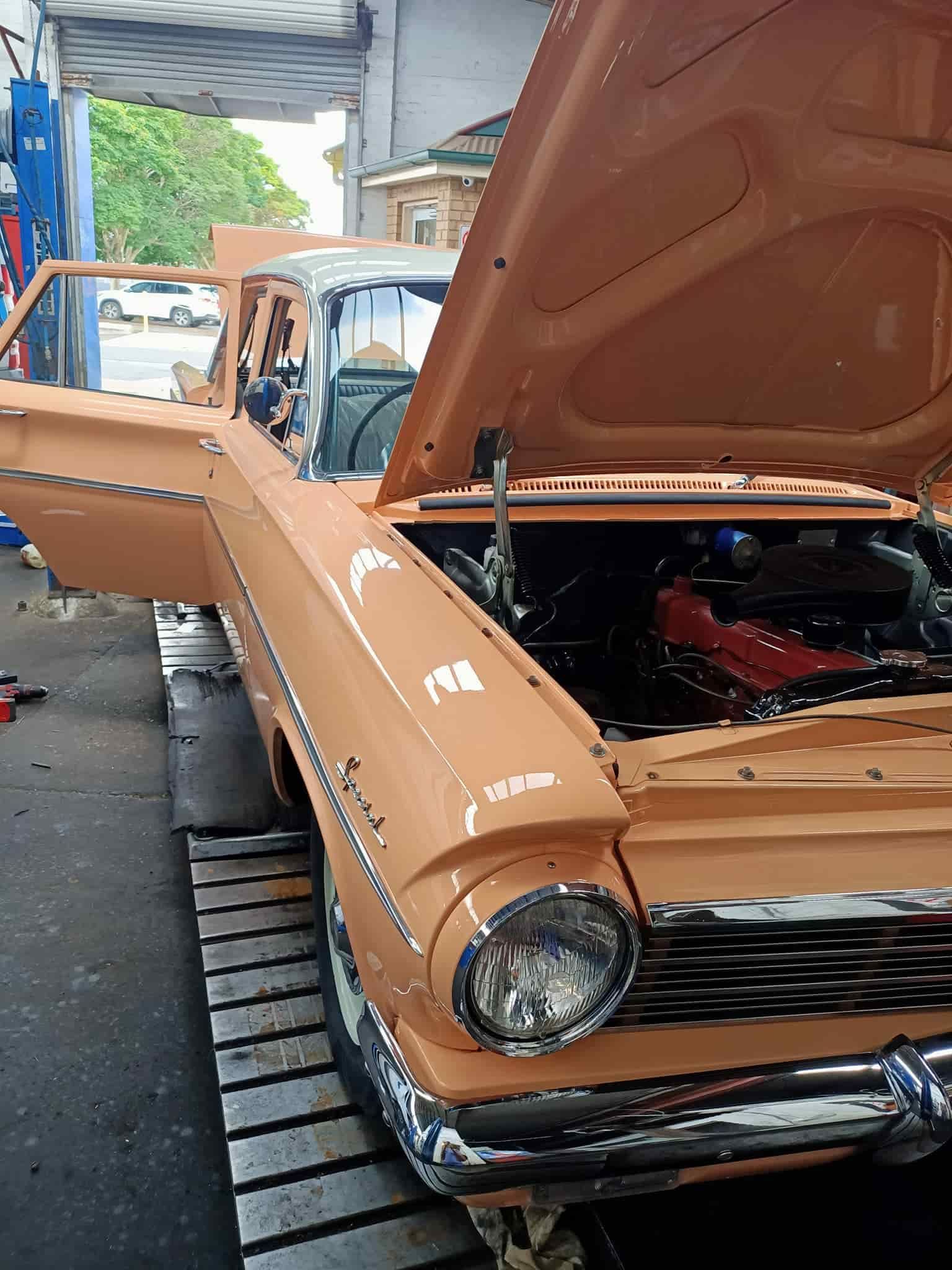 A Car With The Hood Open Is Parked In A Garage — Coughrans Auto Centre  In Toowoomba, QLD
