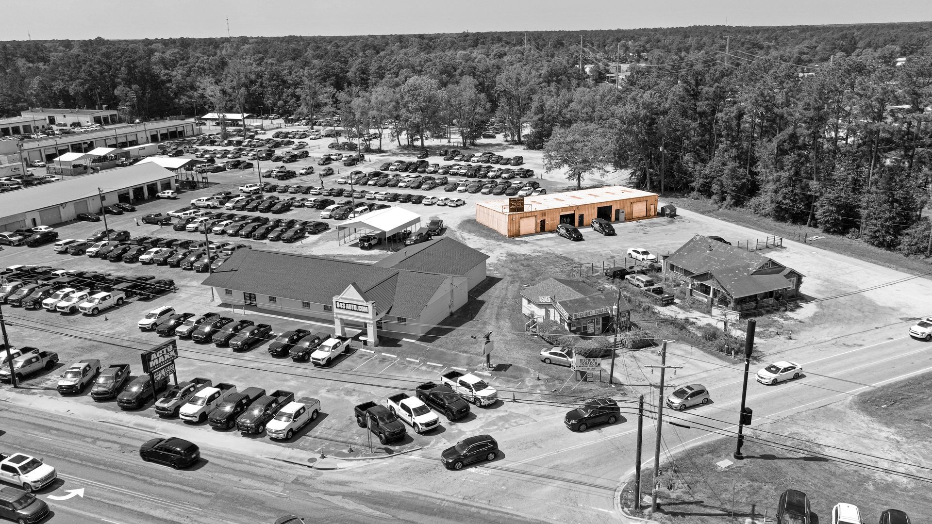 Black and white Aerial viewpoint of our shop location in summerville, with the shop standing out in color to highlight location