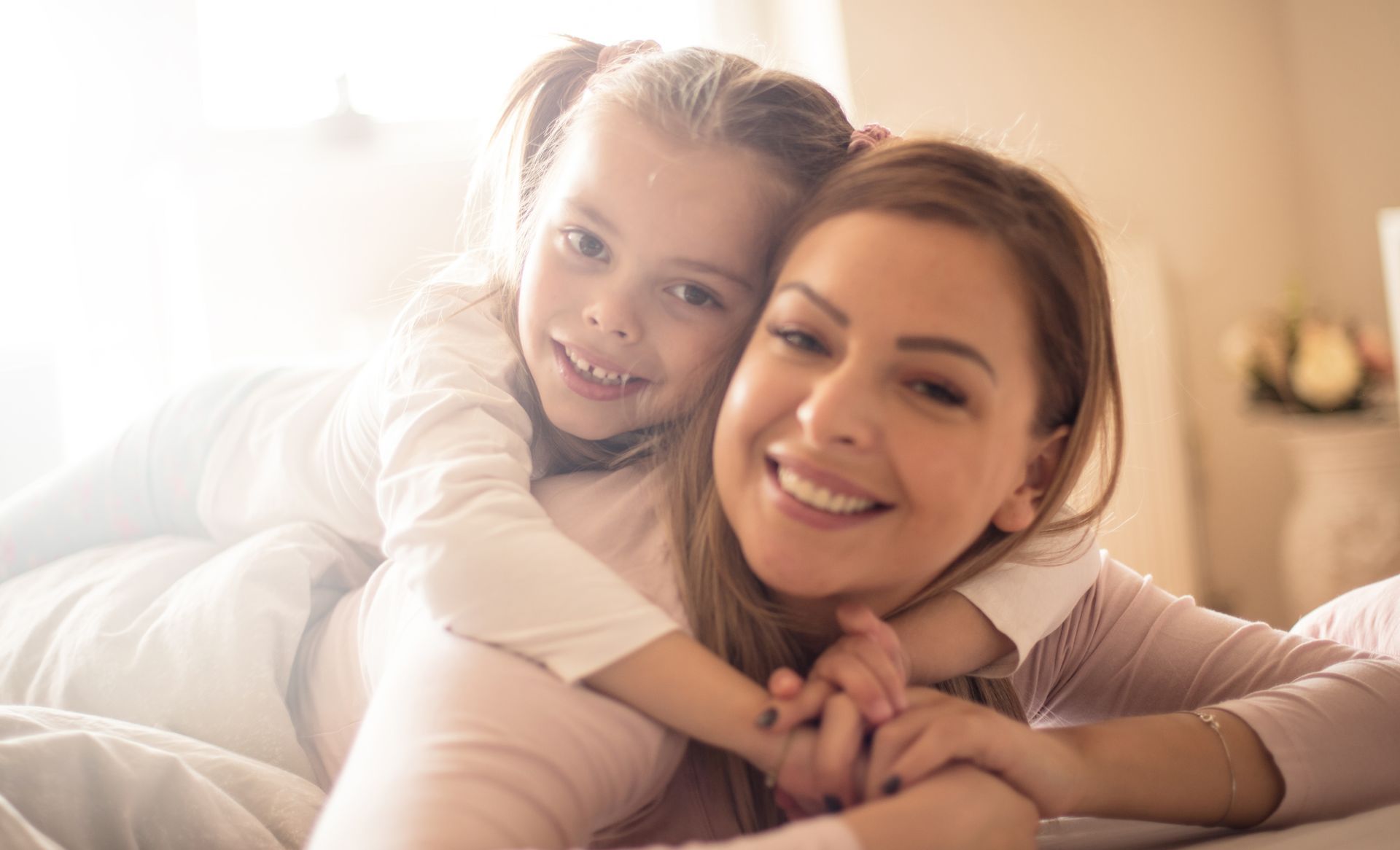 Daughter hugging her mom