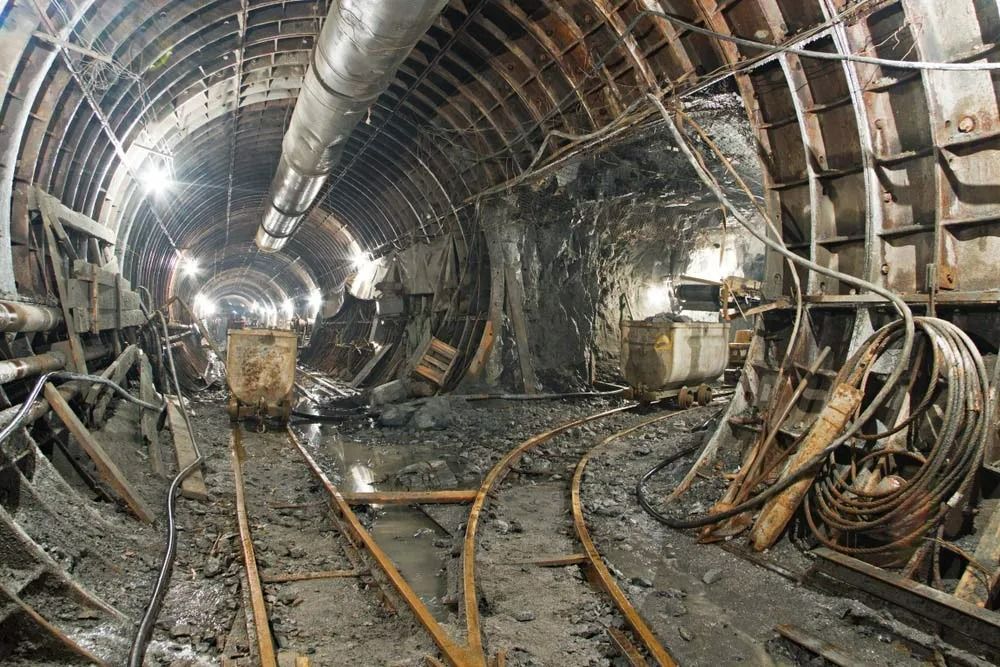 Tunnel Interior, Metal Arches, Tracks, Debris, Pipes — Secure Mine Solutions in Port Ryan, QLD