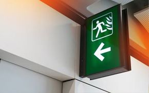 A green fire exit sign