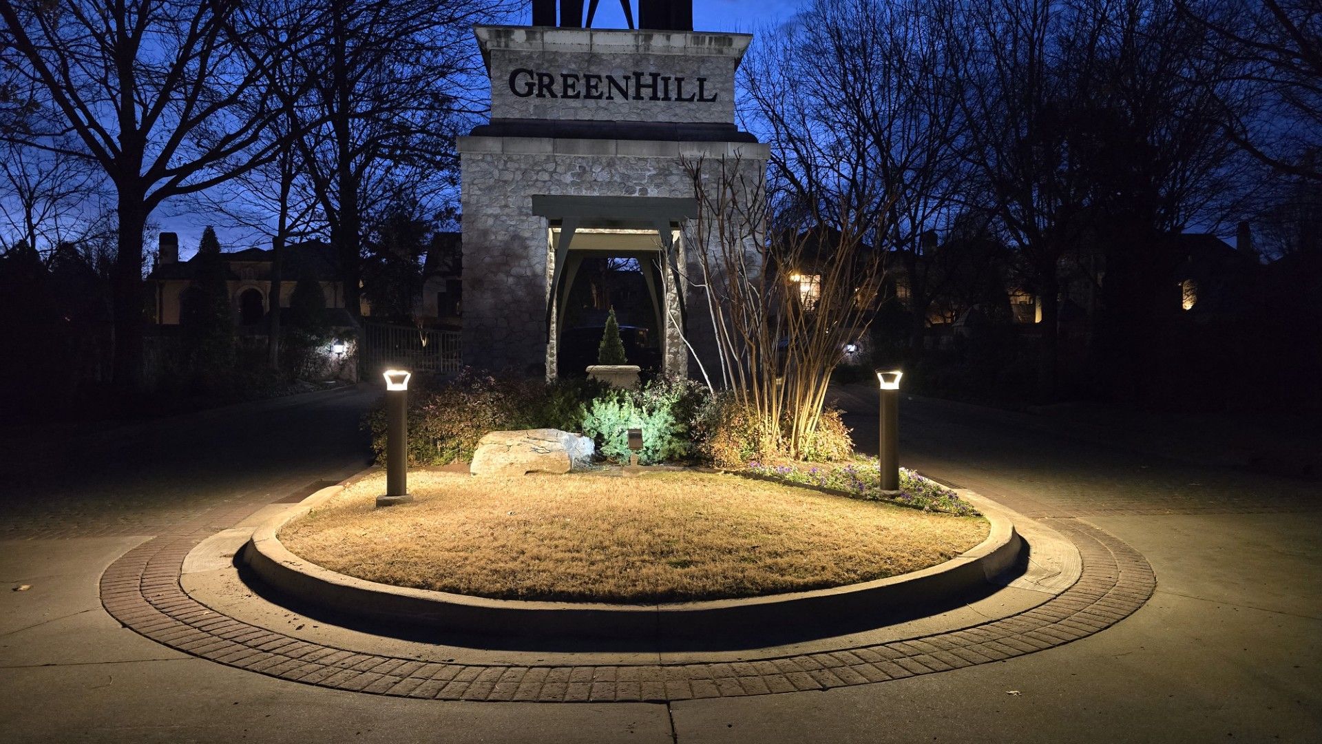 A stone monument labeled 