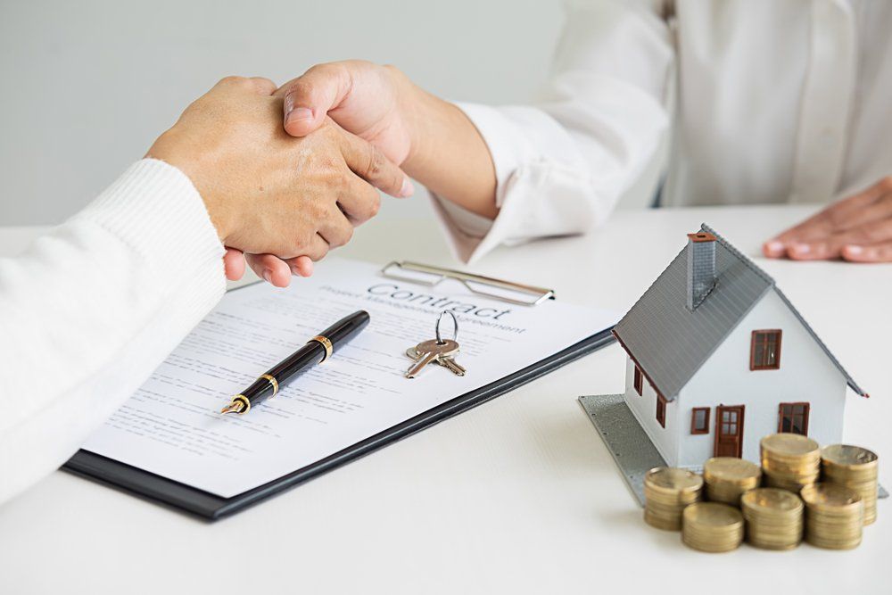 Real Estate Agent Shaking Hands