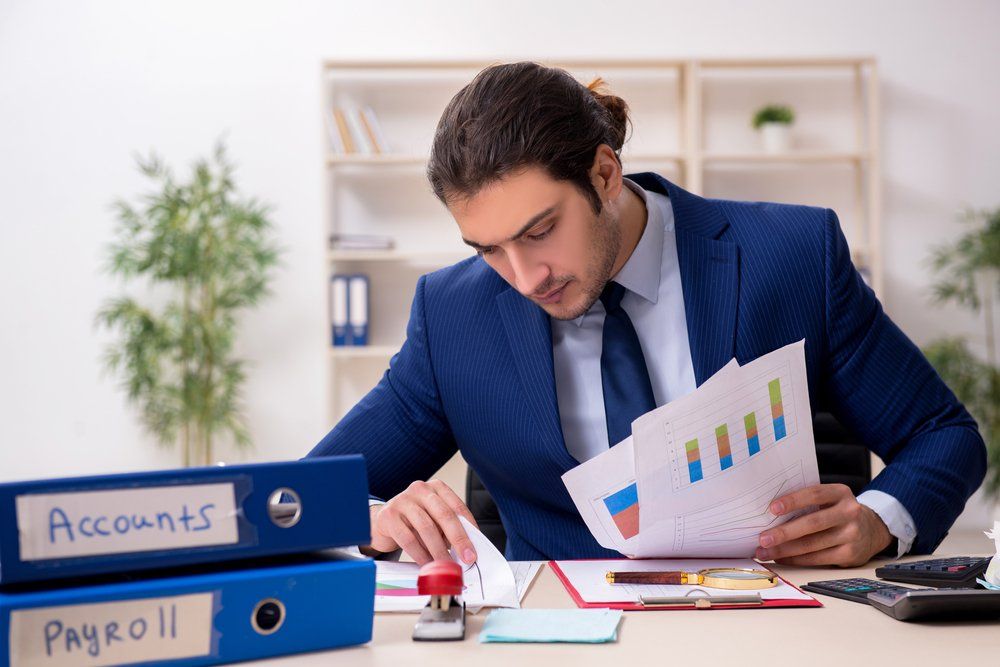 Young Male Financial Manager in the Office
