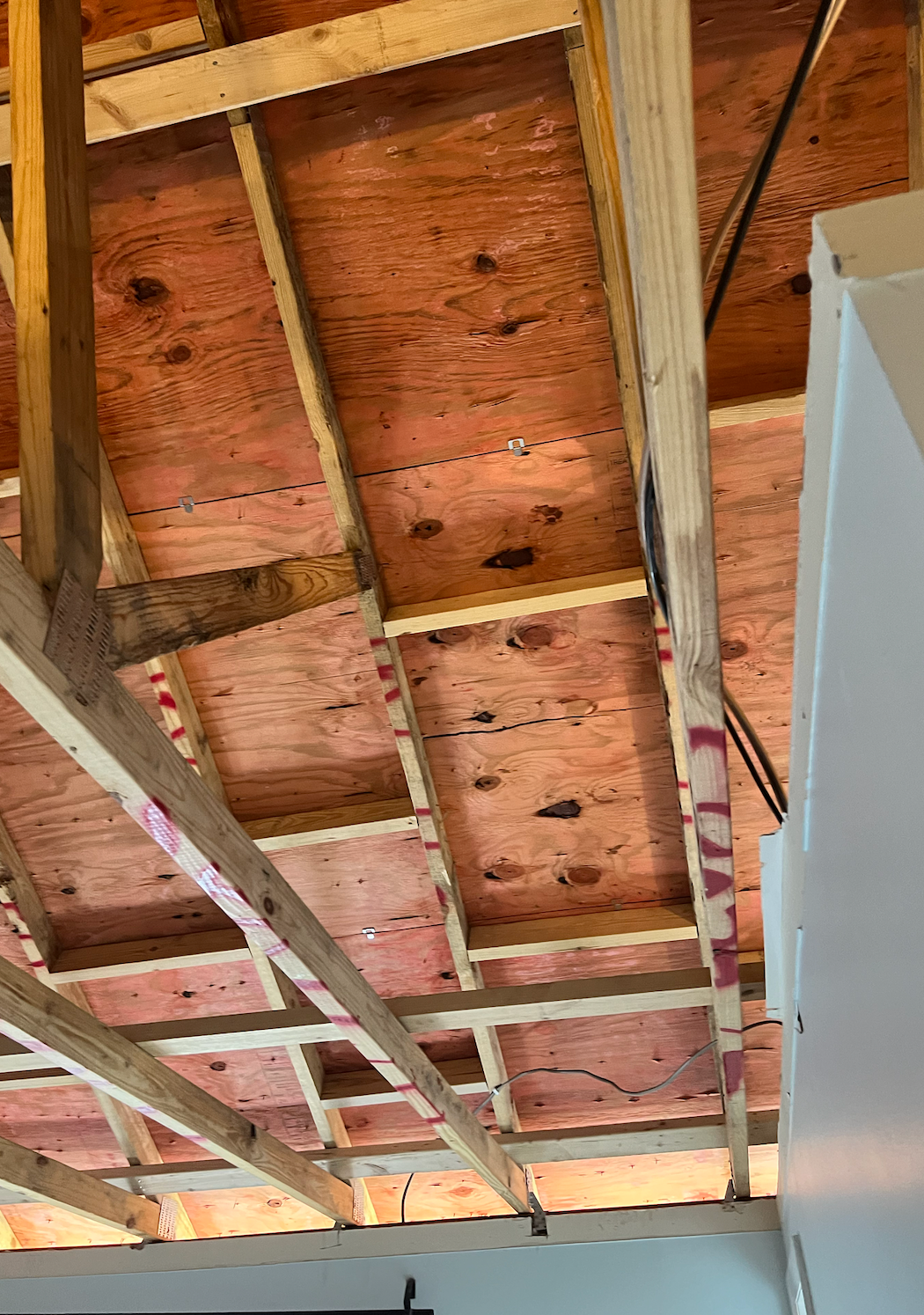 A close up of the ceiling of a building under construction.