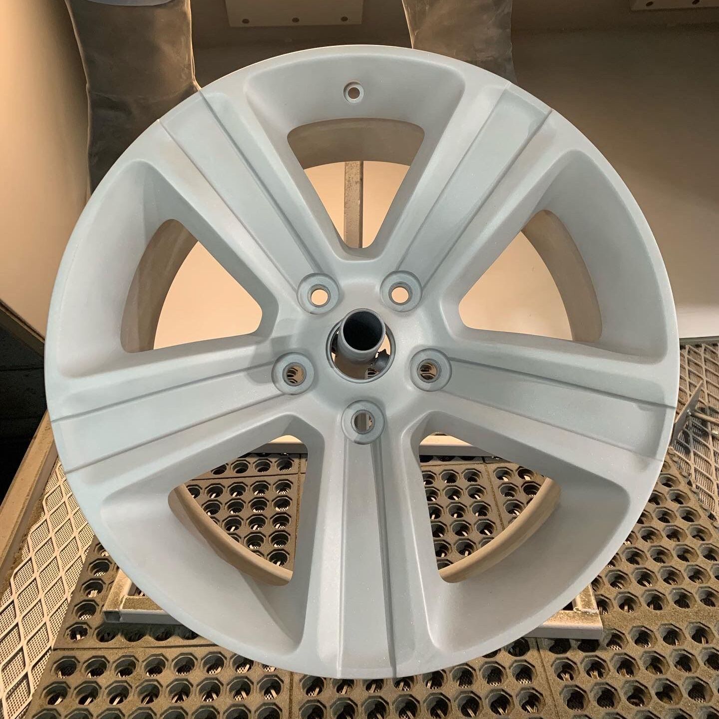Old Wheel Looking Perfectly Clean After Chemical Stripping, Sandblasting, Making Repairs, and Before Applying a Powder Coating