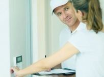 electrician checking alarm system