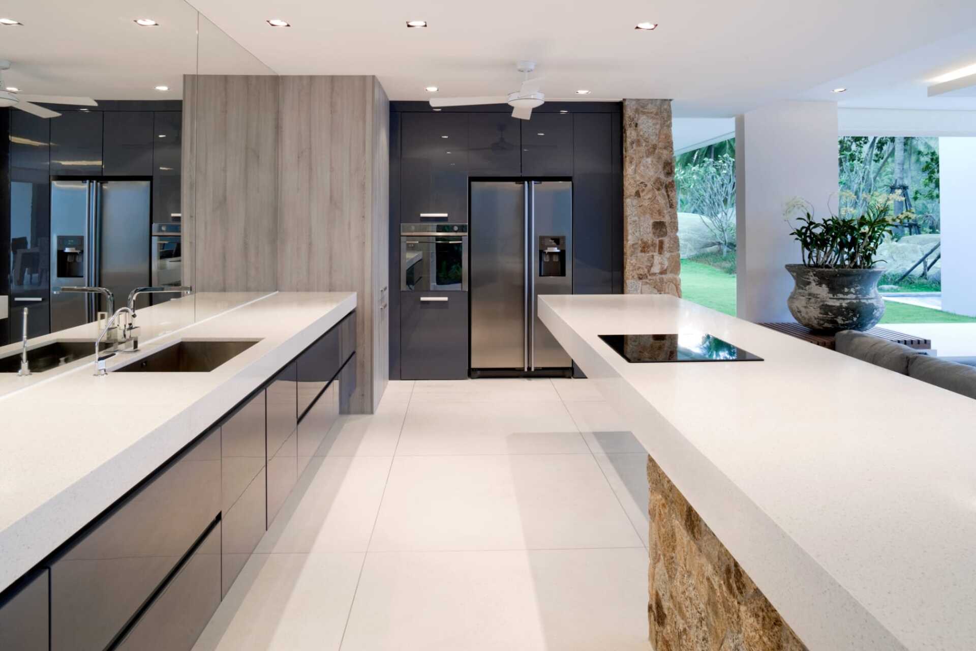 Kitchen area in modern home with sun