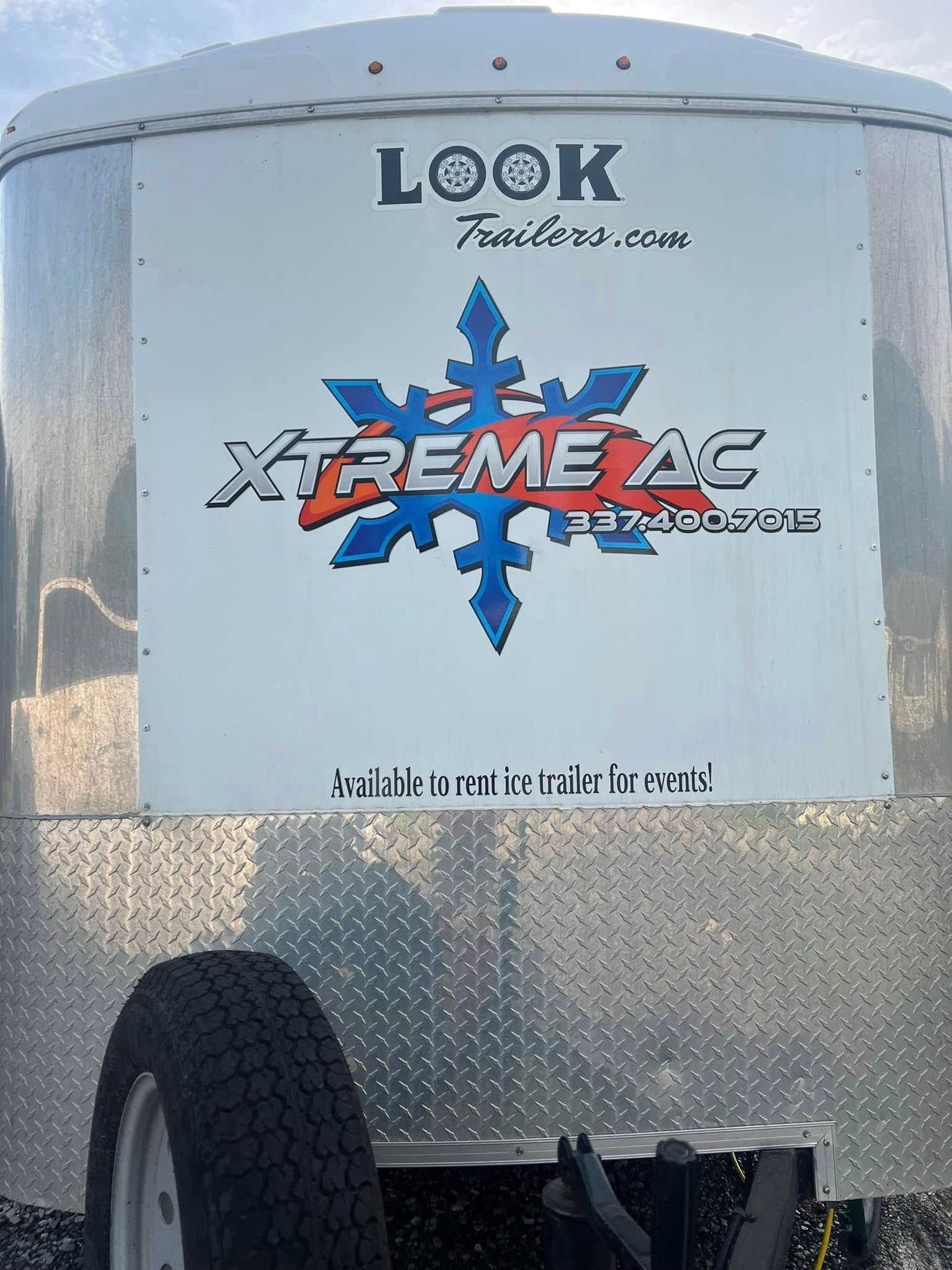 A sign on the side of a trailer that says look xtreme ac