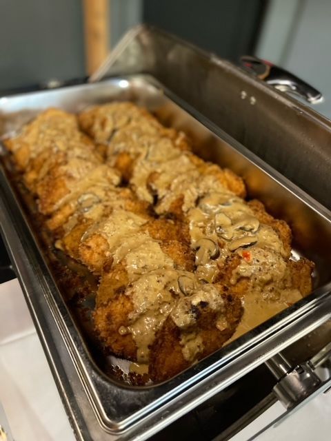 A tray of food is sitting on top of a table.