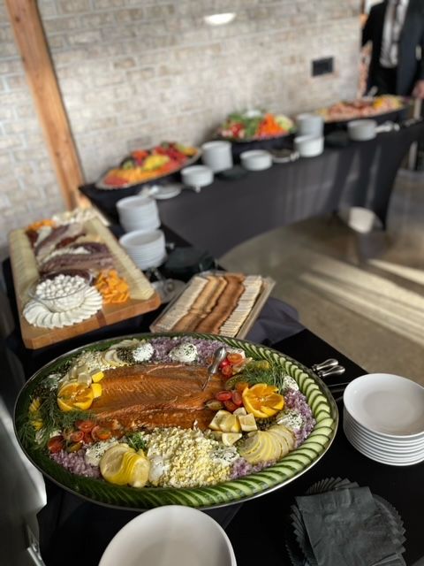 A buffet table with a plate of food on it.