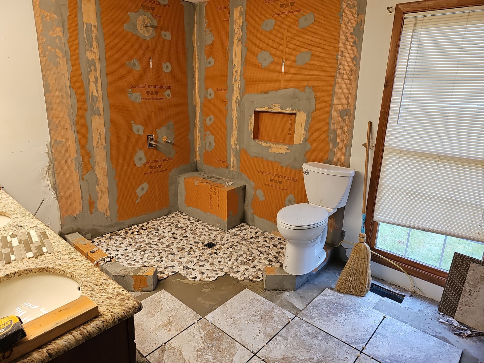 A staircase with peeling paint on the wall.