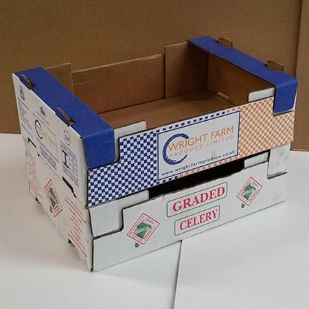 A stack of cardboard crates for fruit or vegetables