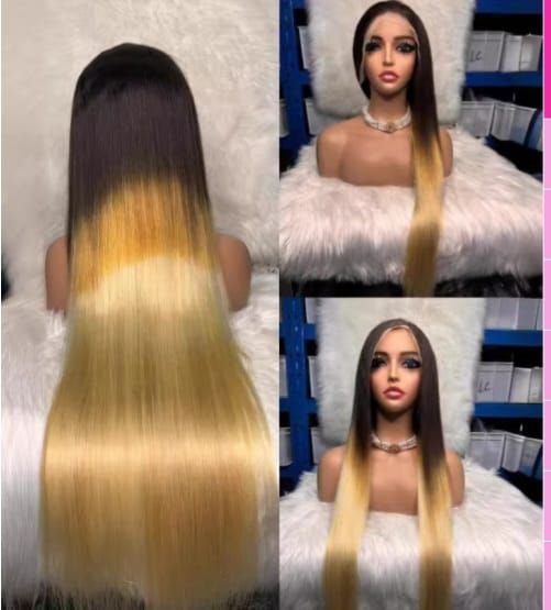 Black-to-blonde ombré hair on a mannequin, shown from the back and front in a salon setting