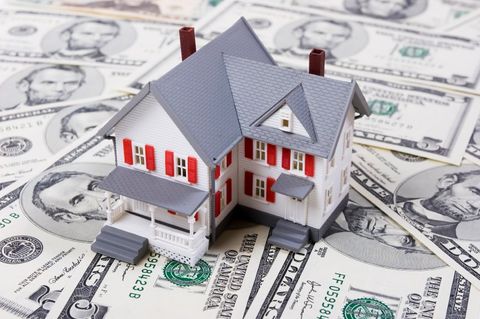 house on dollar bills stock photo
