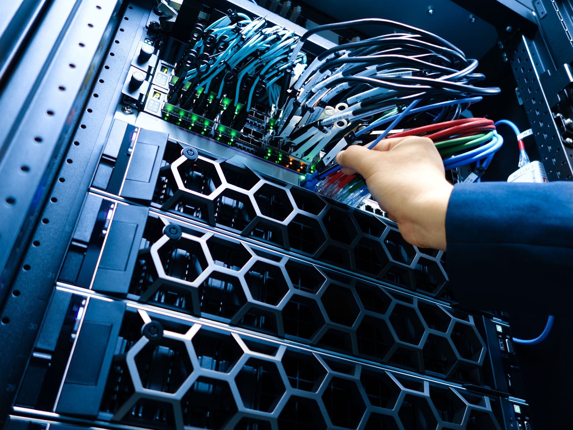Server rack with network cables and connections.