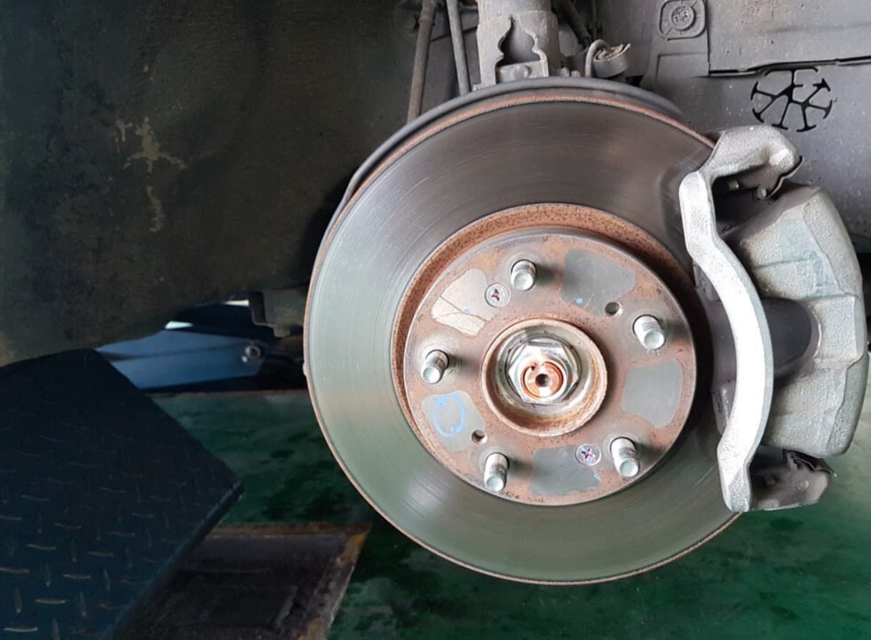 A Close Up Of A Brake Disc On A Car — Uncle Tonys Auto And Mechanical In Currumbin Waters, QLD