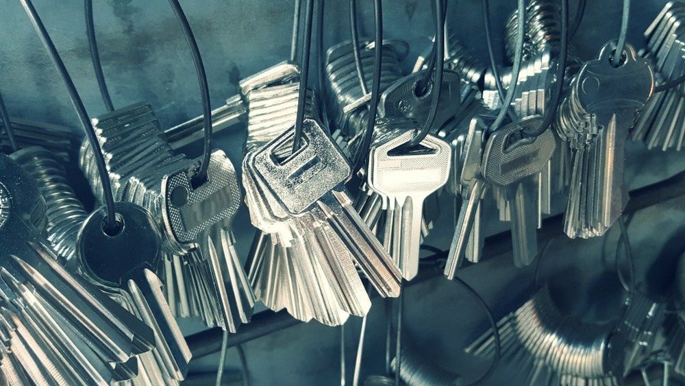 Keys Hanging on Hooks, Mostly Silver, Close-Up Shot — NORTHCOAST LOCKSMITHS & SECURITY In Forster, NSW