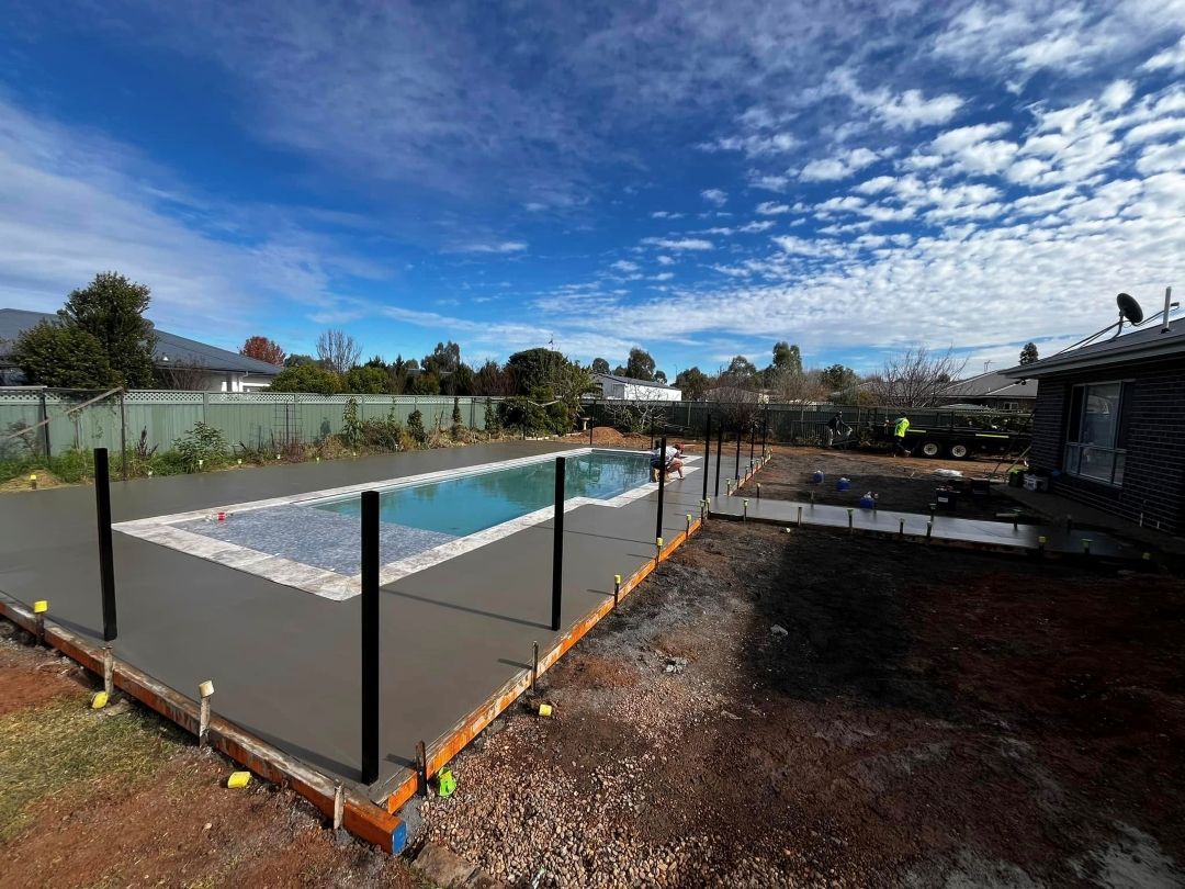 A Swimming Pool is Being Built in the Backyard of a House — All Aspects Concreting & Earthworks Pty Ltd in Dubbo, NSW