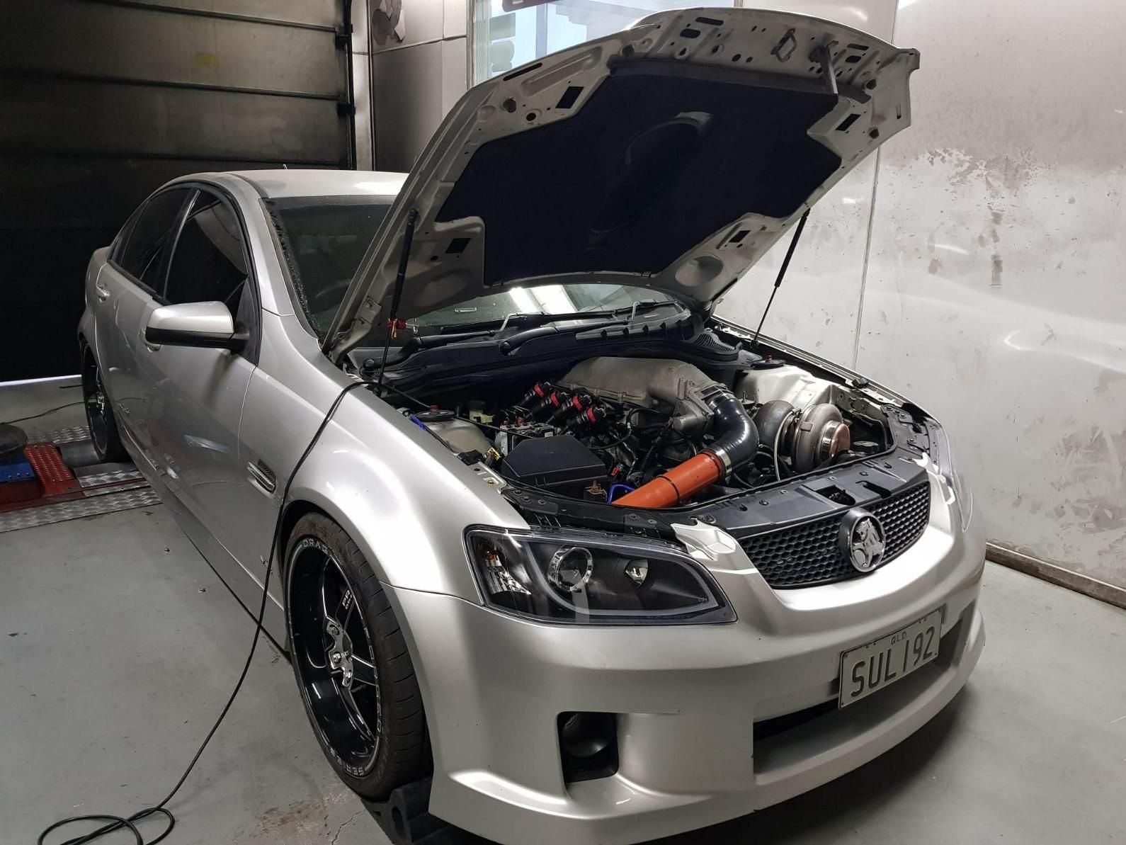 Silver Car with The Hood Open Is Being Worked On — Chrisp Performance in Emerald, QLD