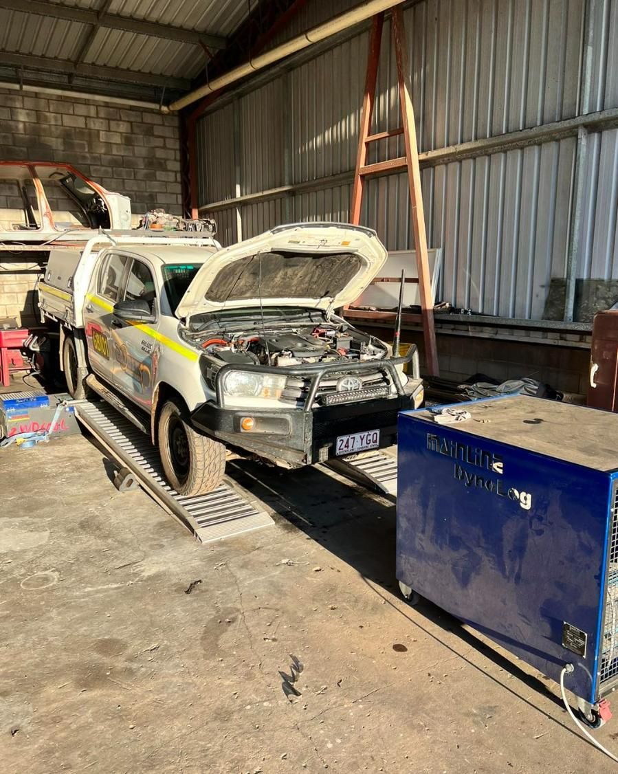 UTE Trailer Car Parked In The Garage With Hood Open — Chrisp Performance in Emerald, QLD