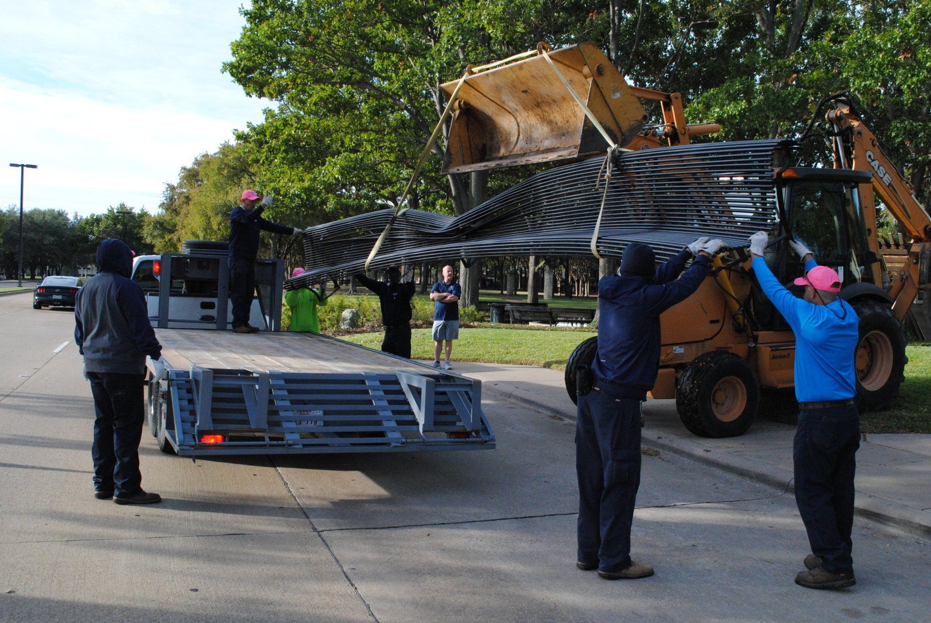 bench_being_loaded_on_to_truck