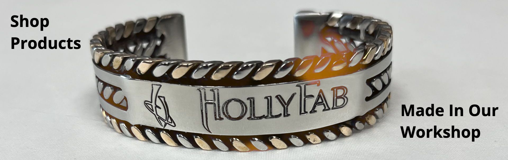 A silver bracelet that says holly fab made in our workshop