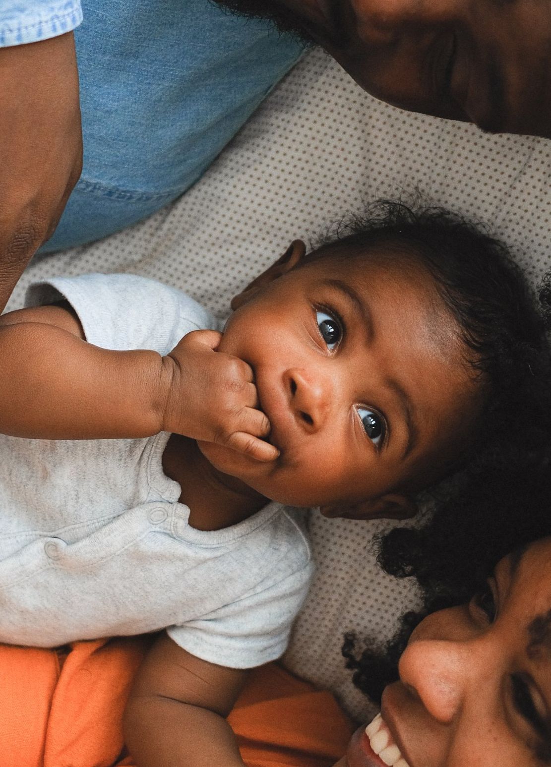 Baby sucking on fingers