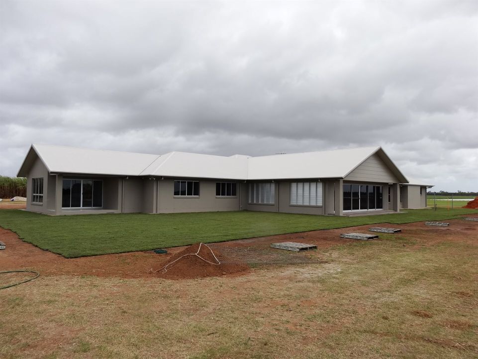 Residential House with Green Lawn — Certcorp DGL in Bundaberg South, QLD