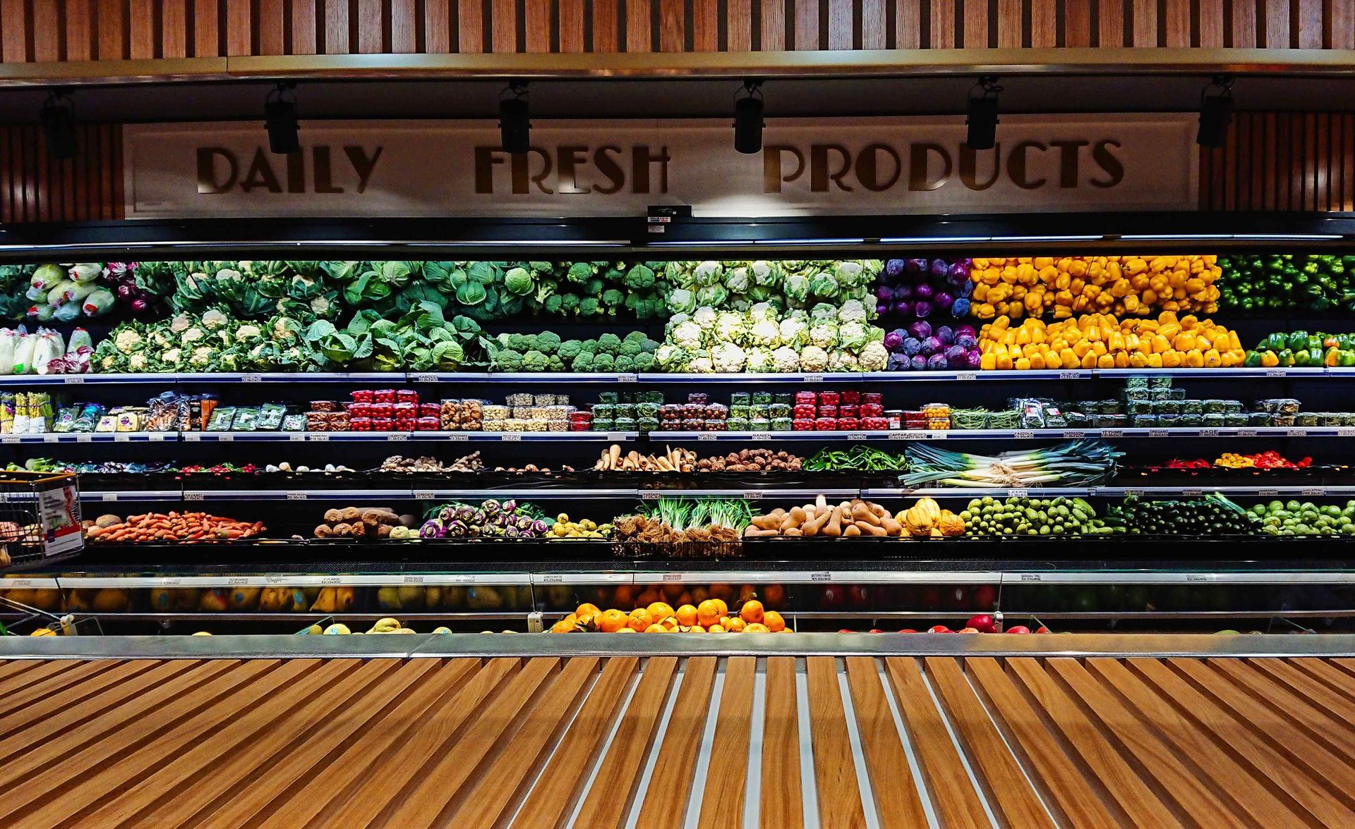 A Grocery Store With A Sign That Says Daily Fresh Products
