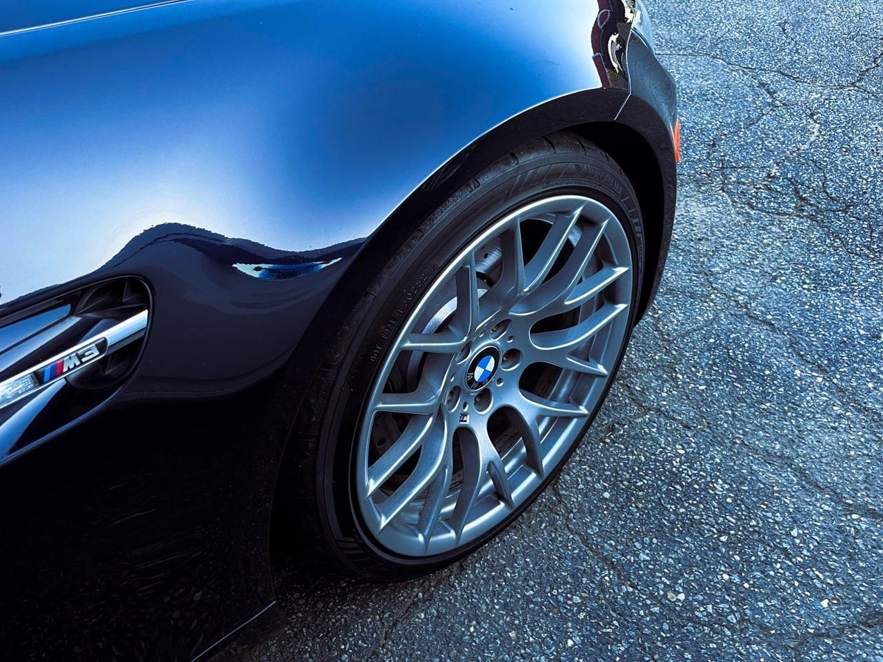 BMW M3 wheel and fender reflection after ceramic coating and polish at Supreme Car Care in Old Bridge, NJ
