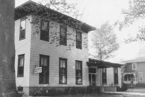 A church with a cross on the front of it