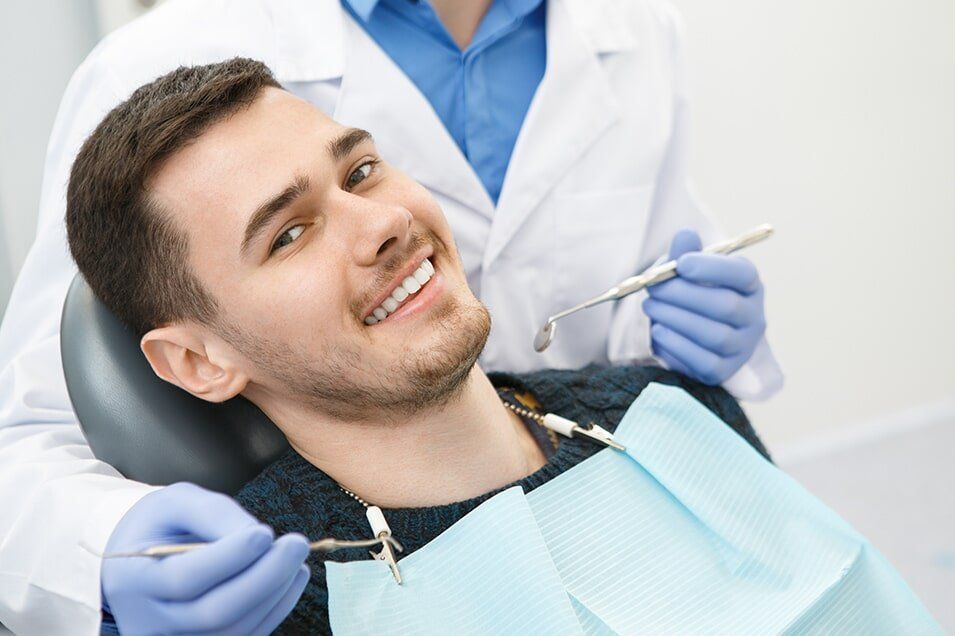 Man smile during dentistry — Hermitage Dental in Port Macquarie, NSW
