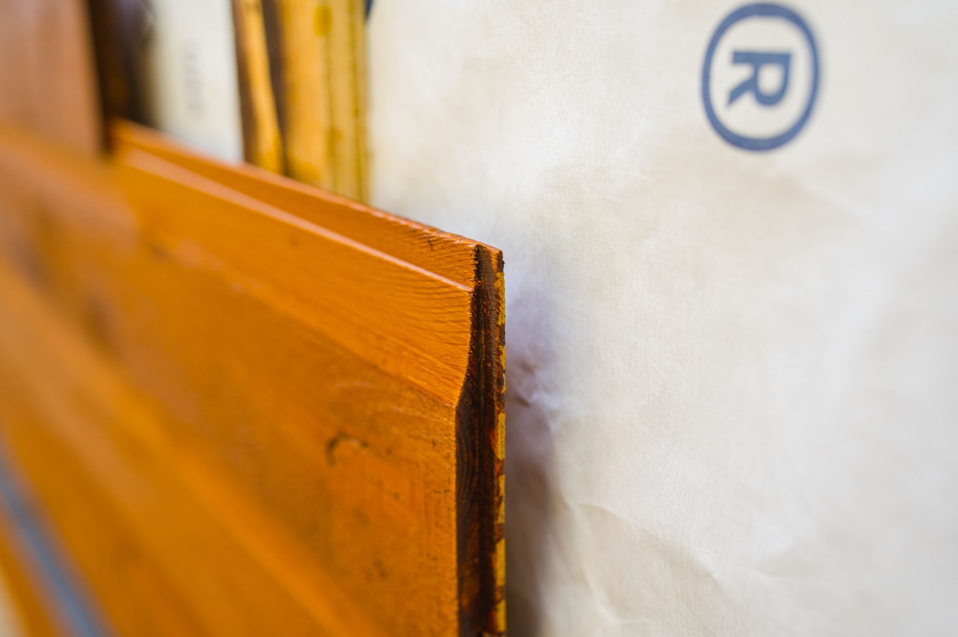 A close up of a piece of wood on a wall.