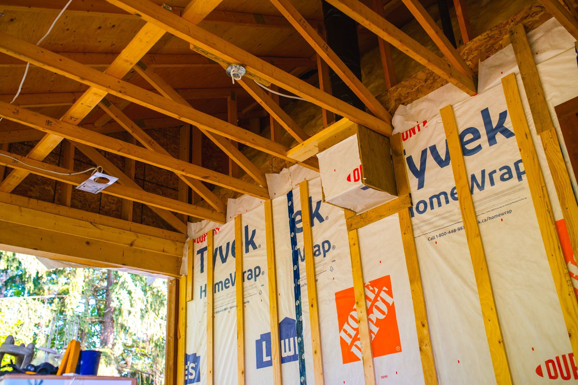 A house is being built with a home depot logo on the wall