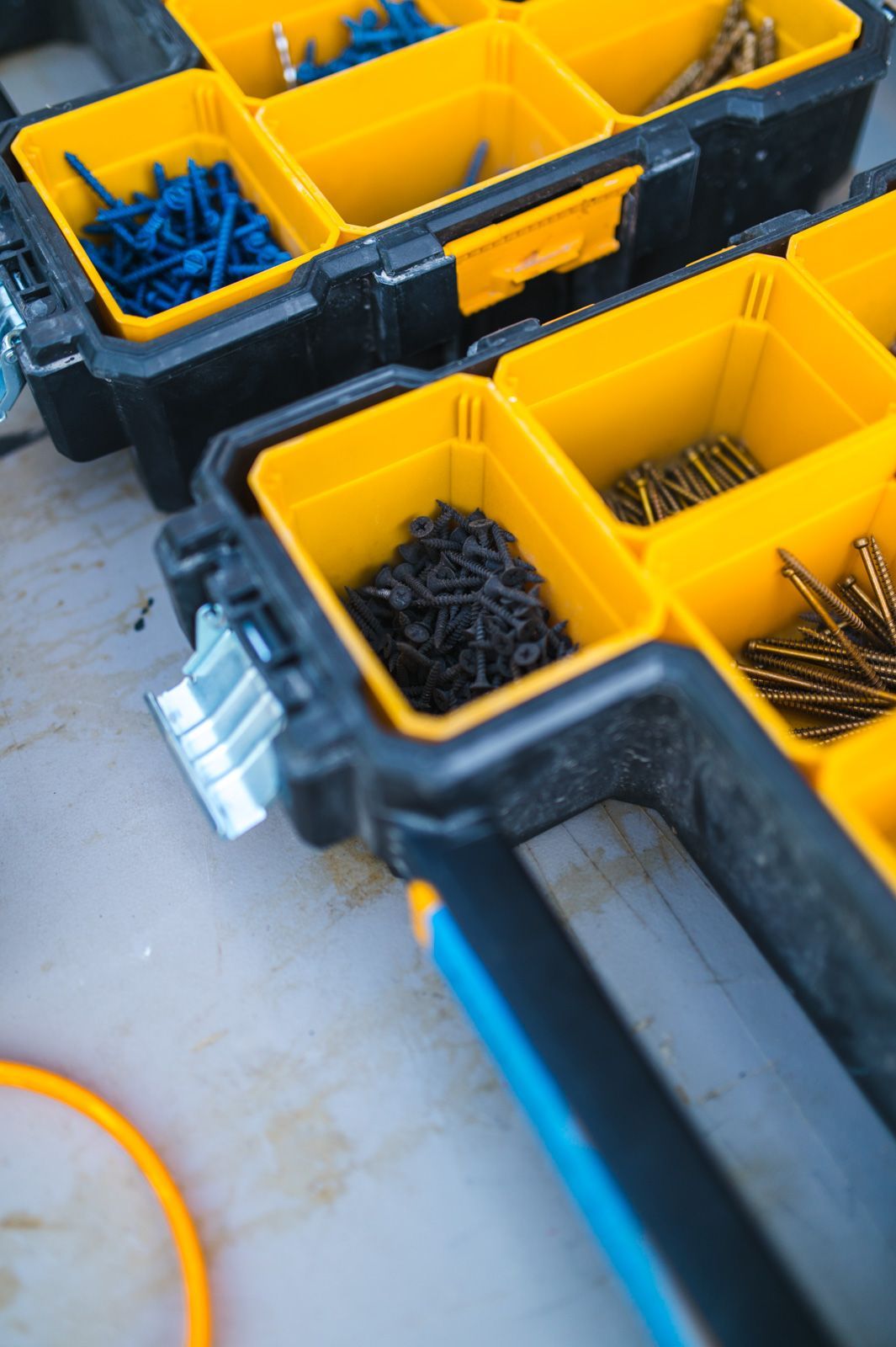 A close up of a toolbox filled with different types of tools.
