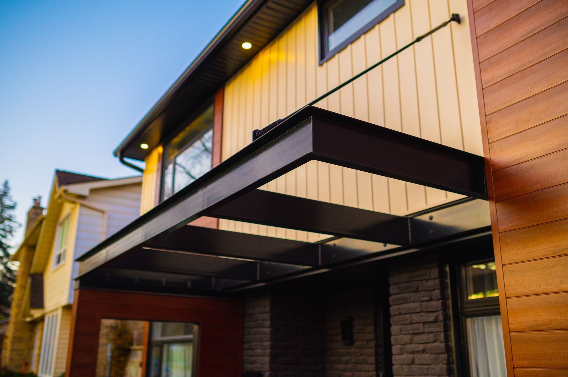 A house with a canopy over the front door