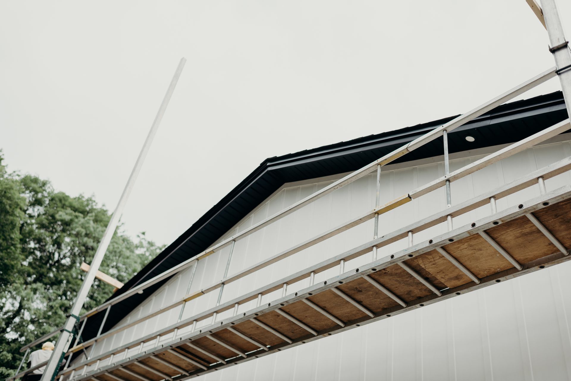 A ladder is attached to the side of a building.