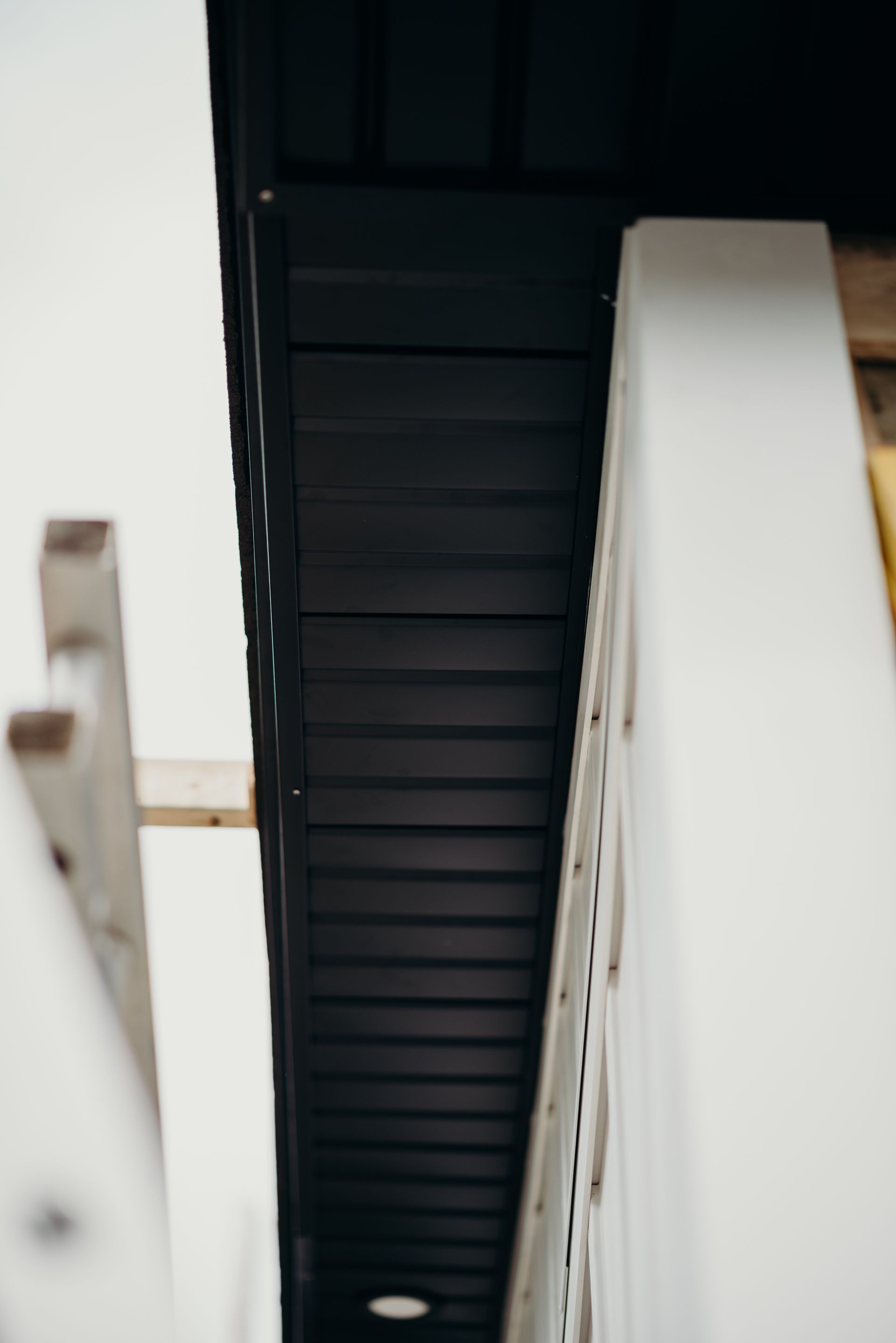 Looking up at the ceiling of a building.