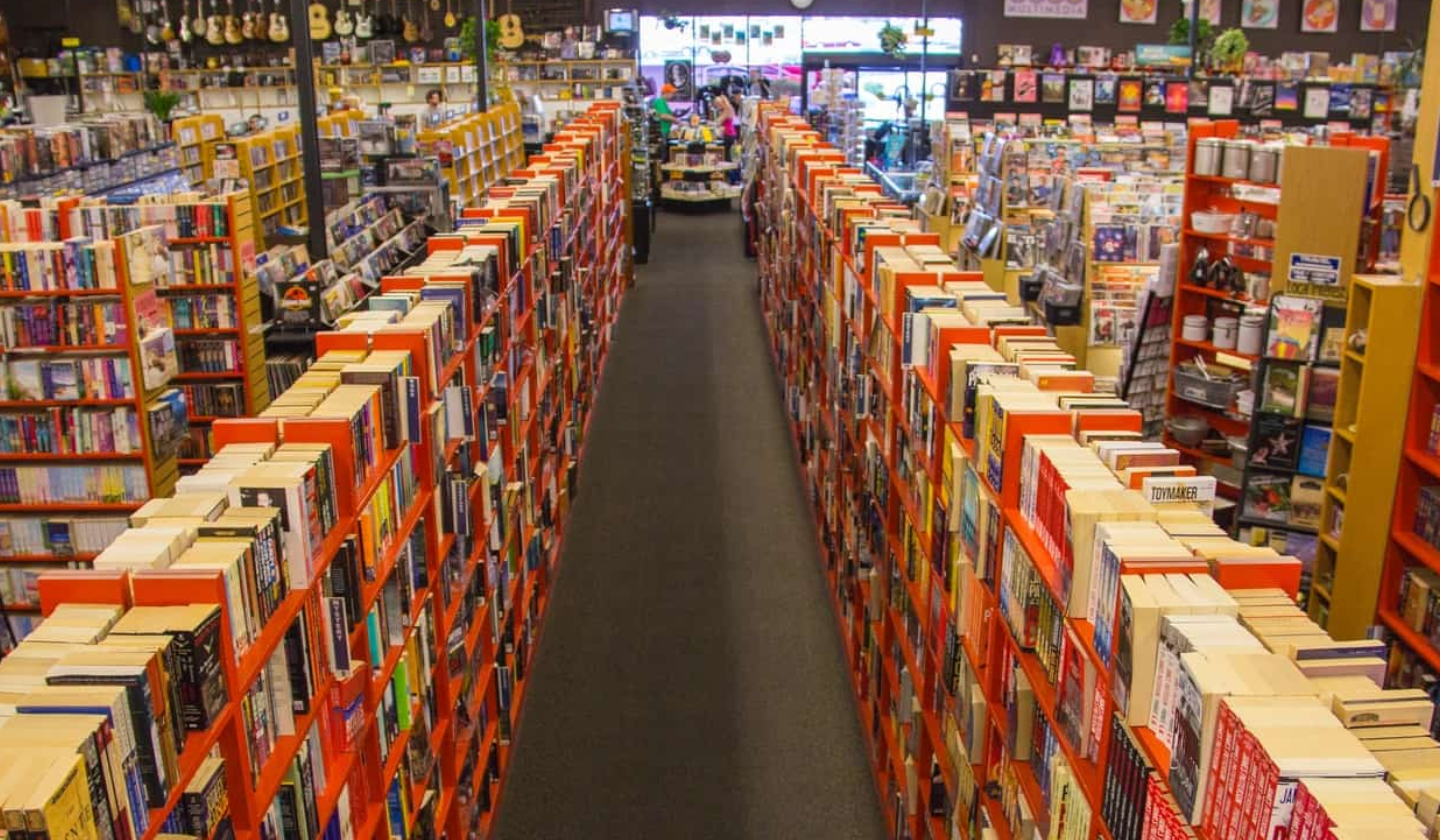 Rows of books and supplies at Bookmans Exchange Tucson shown.