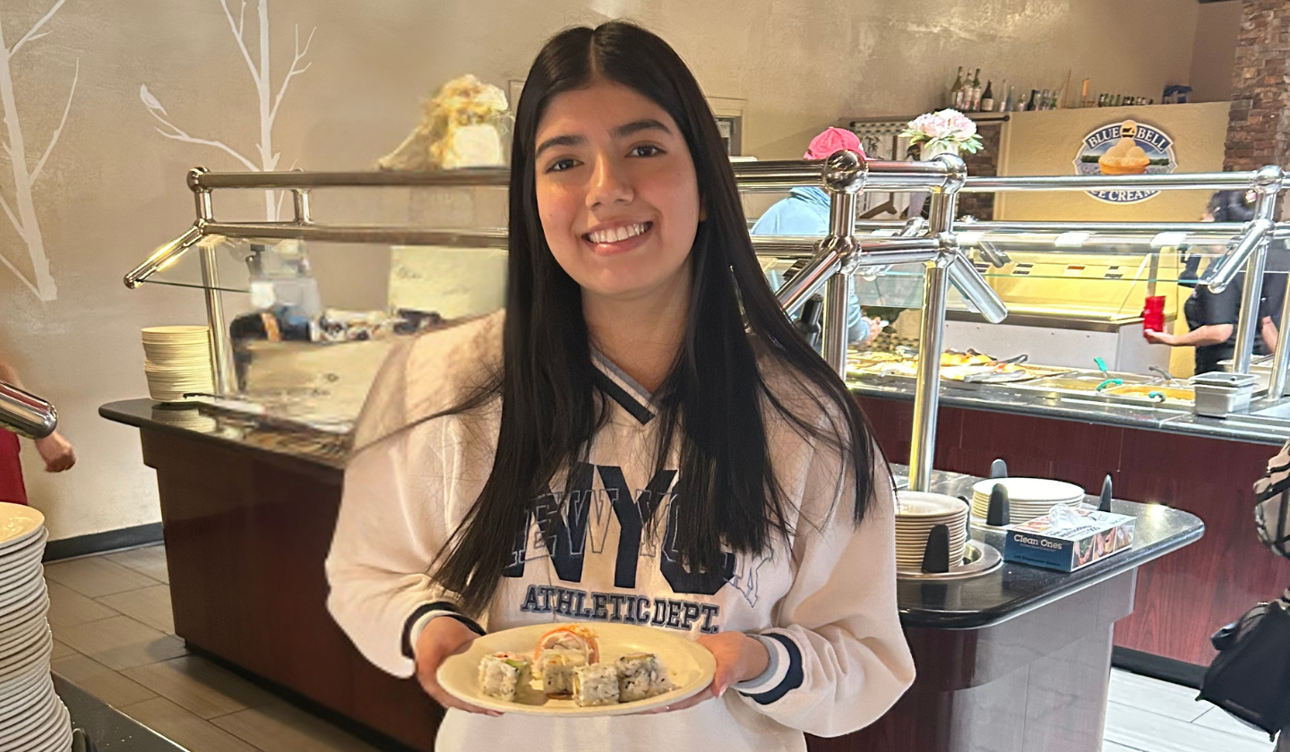 Female resident at the Seasons Tucson Friendsgiving Event at a Chinese Buffet.