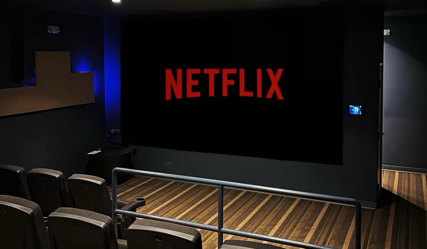 The Seasons' private onsite movie theater with NETFLIX on the screen.
