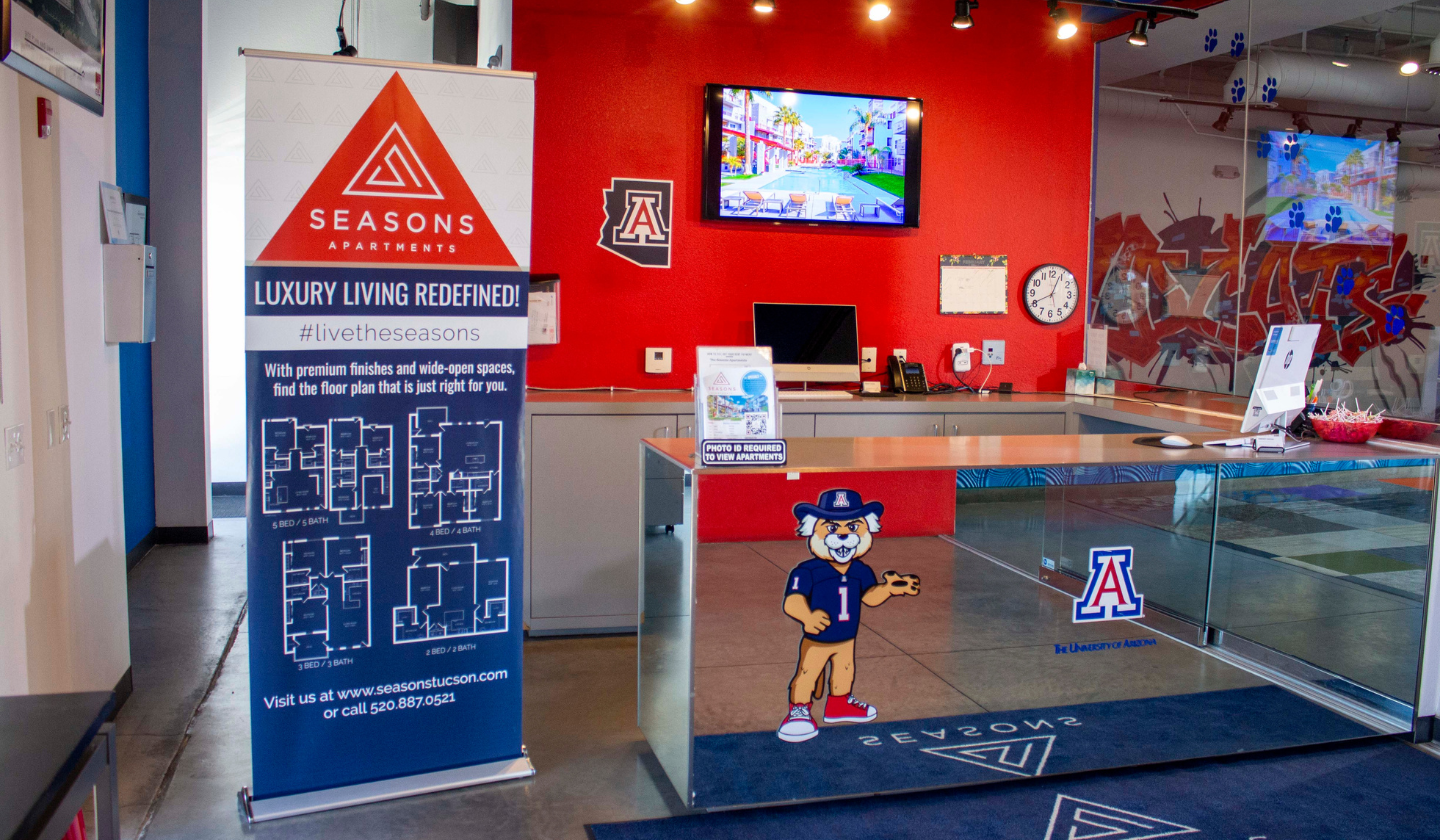 The lobby of the Seasons is shown decorated with Wildcat pride! University of Arizona logo, mascot,…