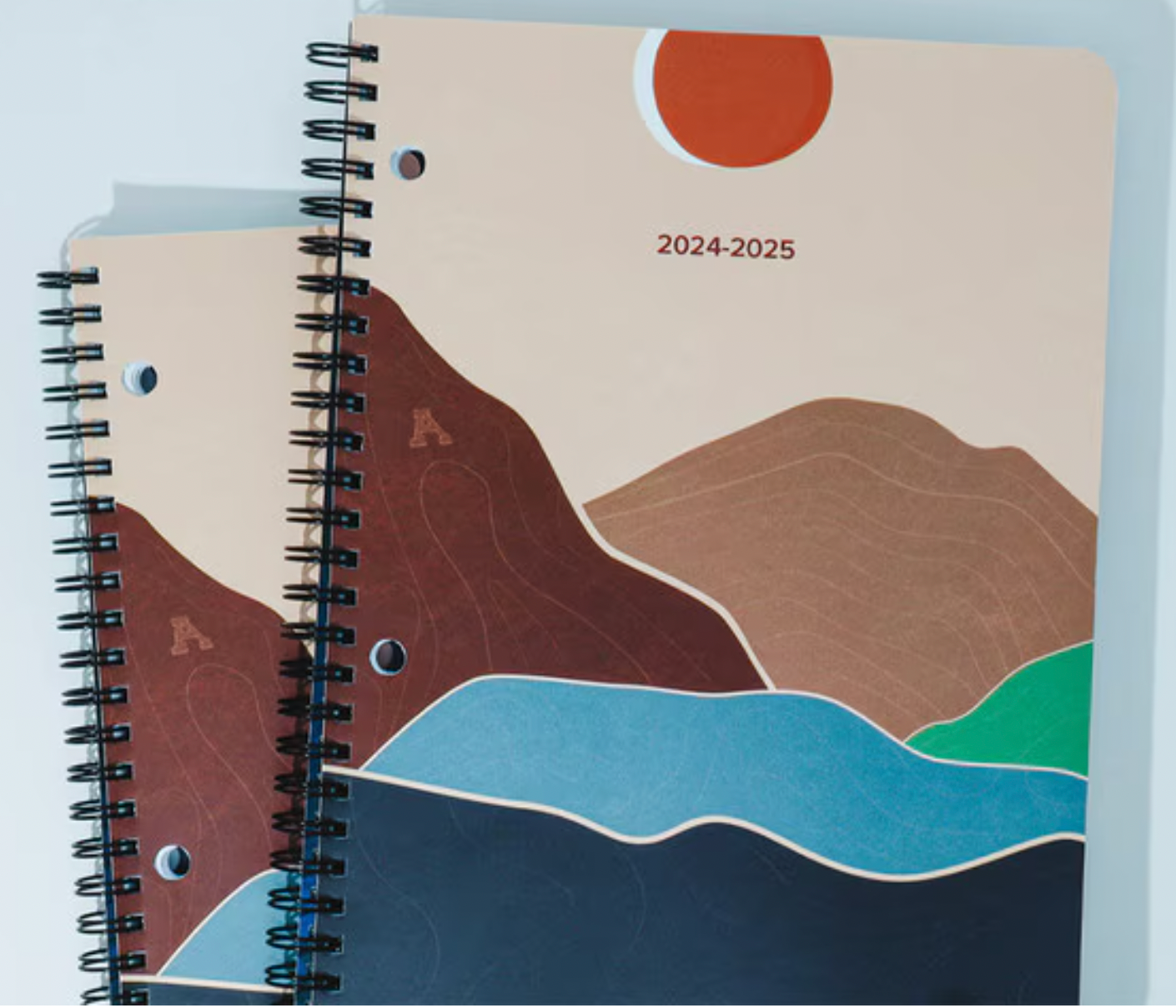 The 2024-2025 UOA student planner is shown. Available for purchase at the UOA student bookstore.