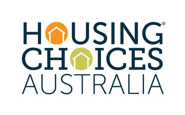 Logo for Housing Choices Australia with the text stacked in dark blue, featuring orange and light green house icons.