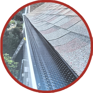 A picture of a gutter on the side of a house.