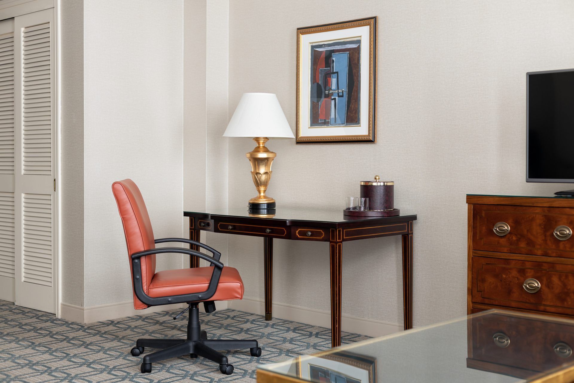 Desk with office chair in guest room