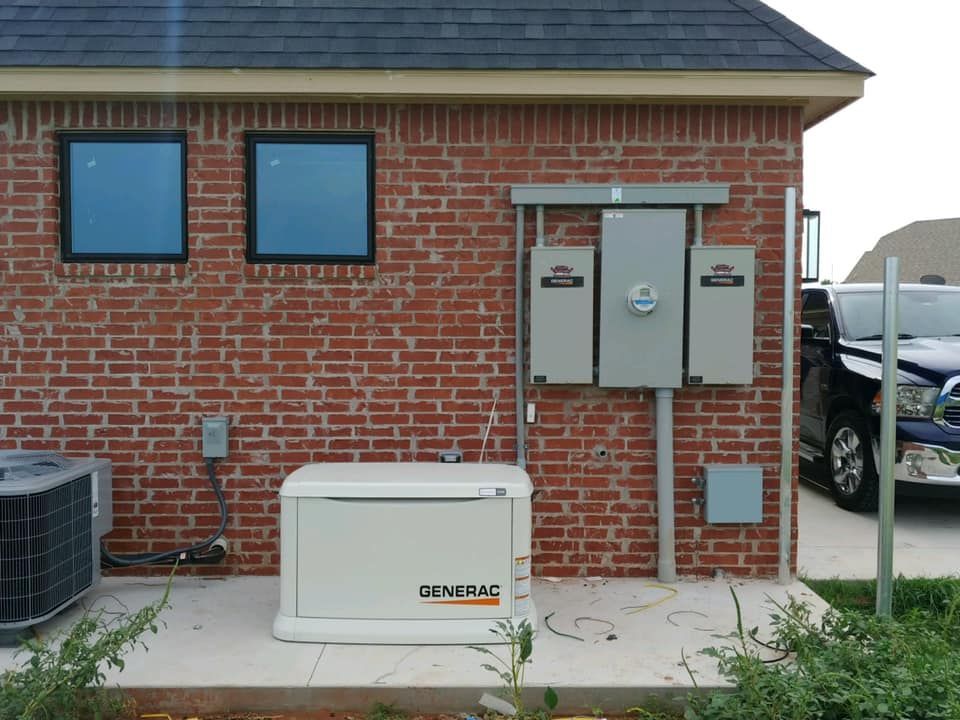 a brick building with a generator on the side of it