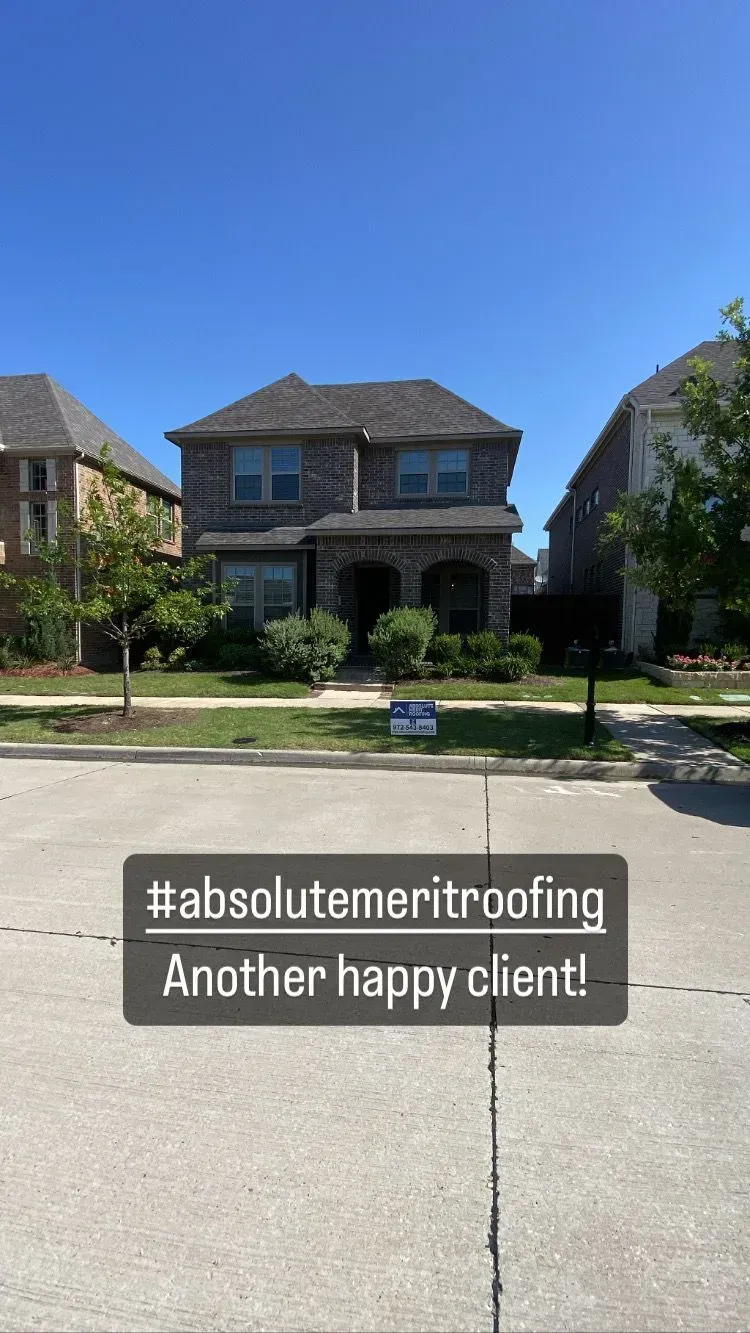 A house with a sign that says another happy client