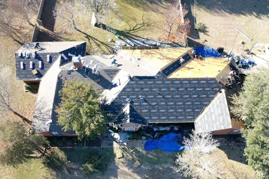 An aerial view of a house that is being remodeled